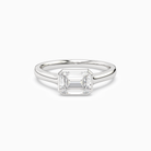 Emerald East-West Bezel Solitaire in Platinum main white