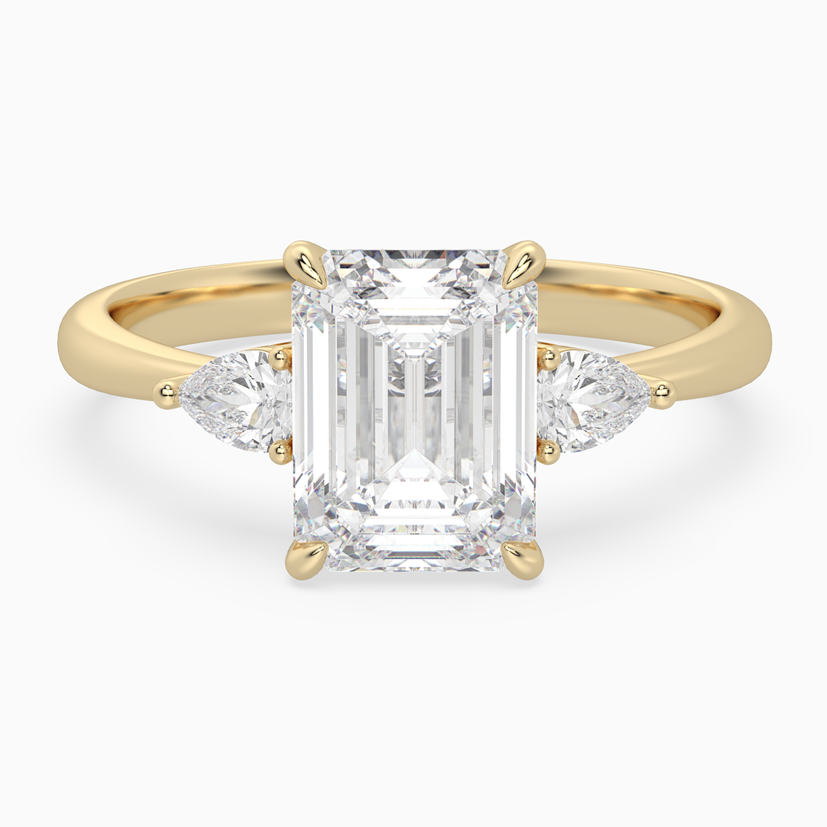 Emerald Pear Side Three Stone Classic in 18K Yellow Gold main white