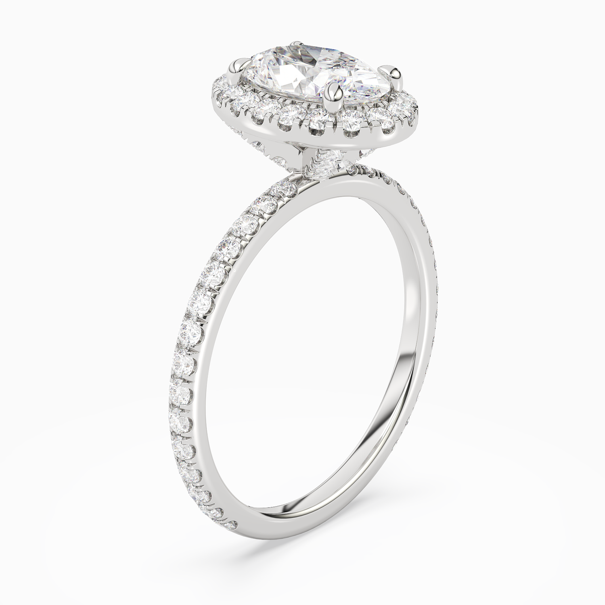 Oval Scalloped Halo Pavé in Platinum angled