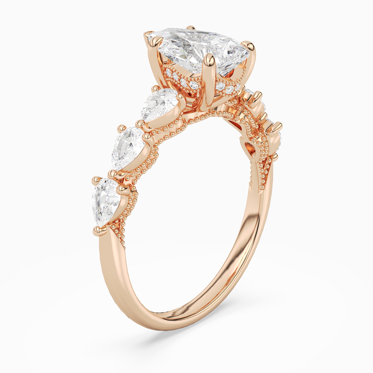 Pear Crescent Pear Side Stone in 14K Rose Gold angled