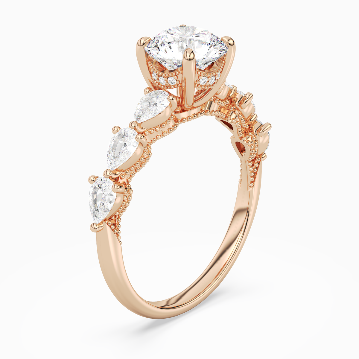 Round Crescent Pear Side Stone in 14K Rose Gold angled
