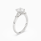 Heart Pear Scroll Side Stone in Platinum angled