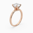 Round Petite Classic Solitaire in 14K Rose Gold angled