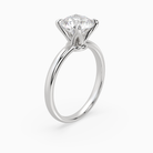 Round Petite Classic Solitaire in 14K White Gold angled