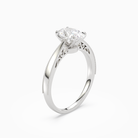 Oval Milgrain Edge Solitaire in 18K White Gold angled
