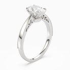 Oval Milgrain Edge Solitaire in 18K White Gold angled