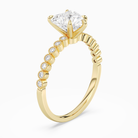Heart Accent Shoulder Solitaire in 14K Yellow Gold angled