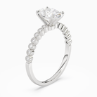 Oval Accent Shoulder Solitaire in 14K White Gold angled