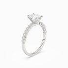 Oval Accent Shoulder Solitaire in Platinum angled