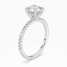 Round Hidden Halo Accent Pavé in 18K White Gold angled