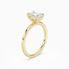 Emerald Hidden Halo Accent Plain in 18K Yellow Gold angled