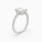 Emerald Classic Basket Pavé Solitaire in Platinum angled