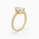 Pear Classic Basket Pavé Solitaire in 14K Yellow Gold angled