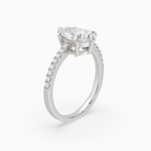 Pear Classic Basket Pavé Solitaire in Platinum angled