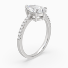 Pear Classic Basket Pavé Solitaire in Platinum angled