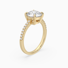 Round Classic Basket Pavé Solitaire in 14K Yellow Gold angled