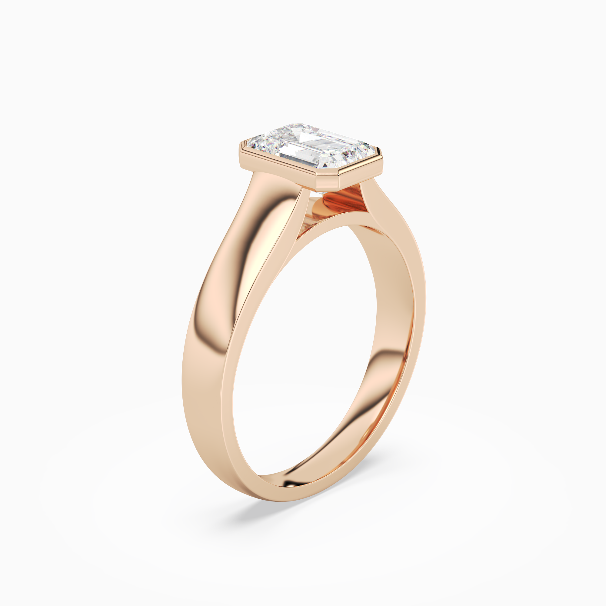 Emerald Wide Tapered Bezel Solitaire in 14K Rose Gold angled