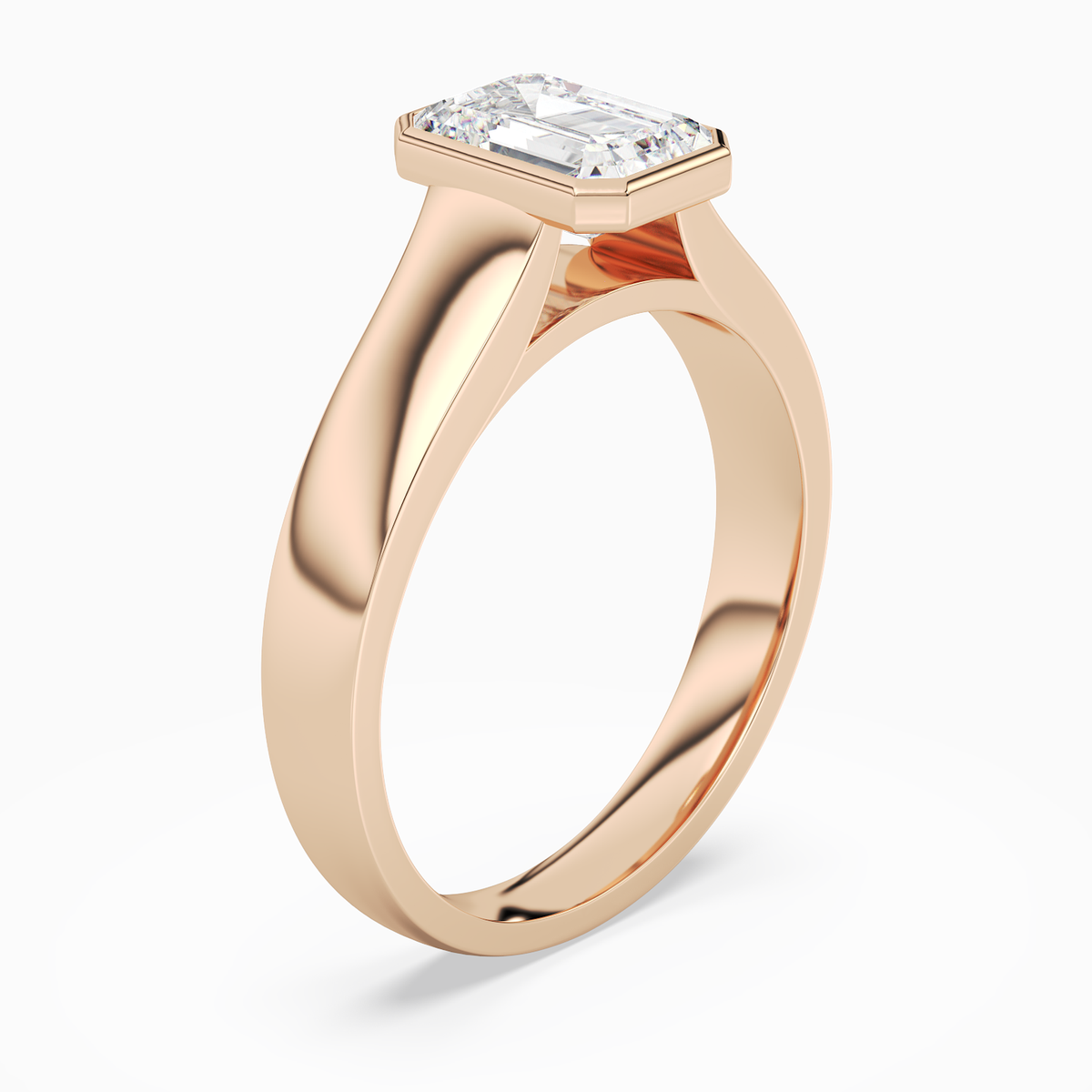 Emerald Wide Tapered Bezel Solitaire in 14K Rose Gold angled