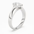 Oval Wide Tapered Bezel Solitaire in 18K White Gold angled