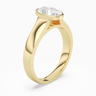 Oval Wide Tapered Bezel Solitaire in 18K Yellow Gold angled