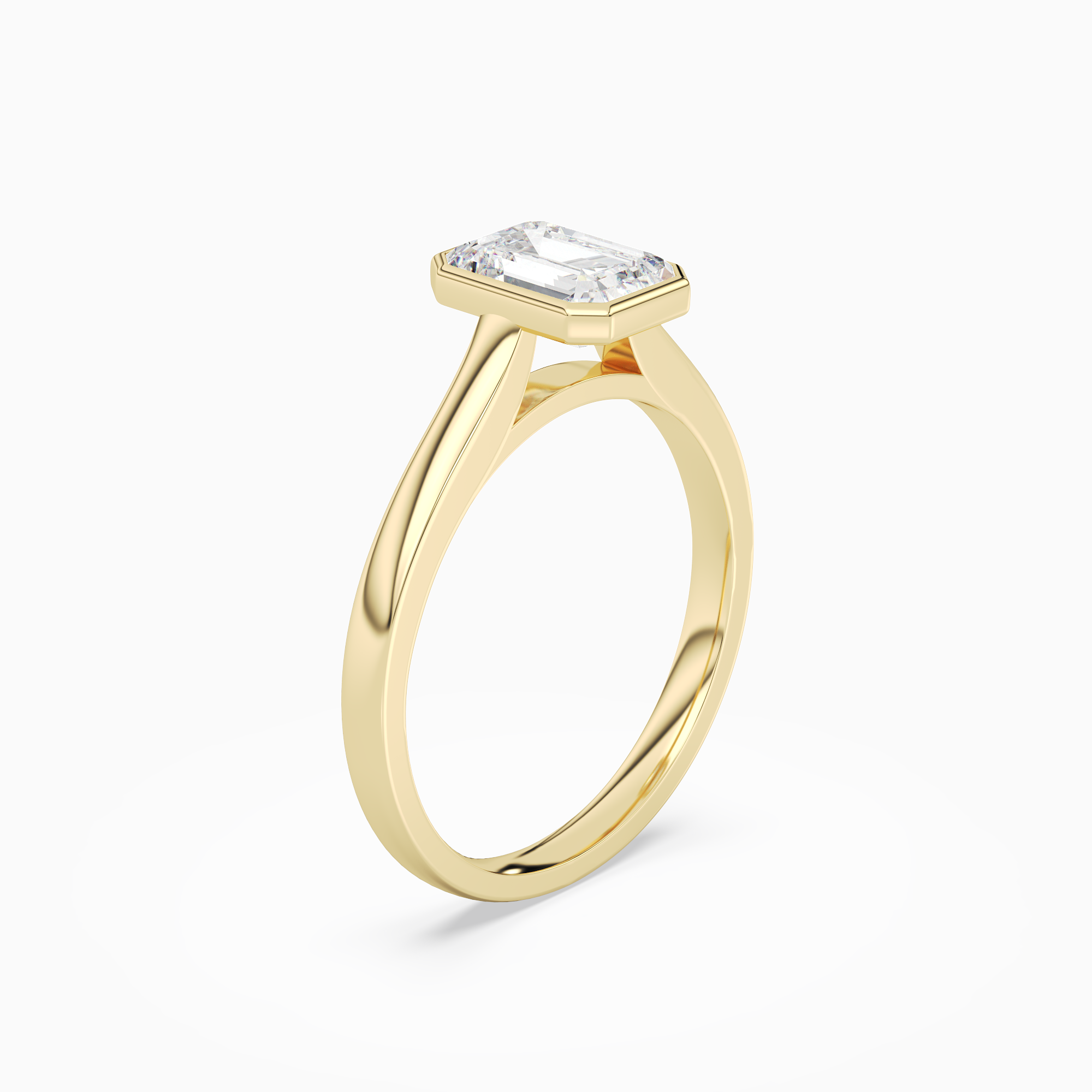 Emerald Medium Tapered Bezel Solitaire in 18K Yellow Gold angled