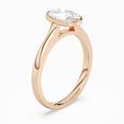 Oval Medium Tapered Bezel Solitaire in 14K Rose Gold angled