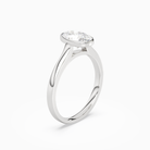 Oval Medium Tapered Bezel Solitaire in 14K White Gold angled