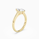 Pear Medium Tapered Bezel Solitaire in 14K Yellow Gold angled