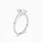 Pear Medium Tapered Bezel Solitaire in Platinum angled