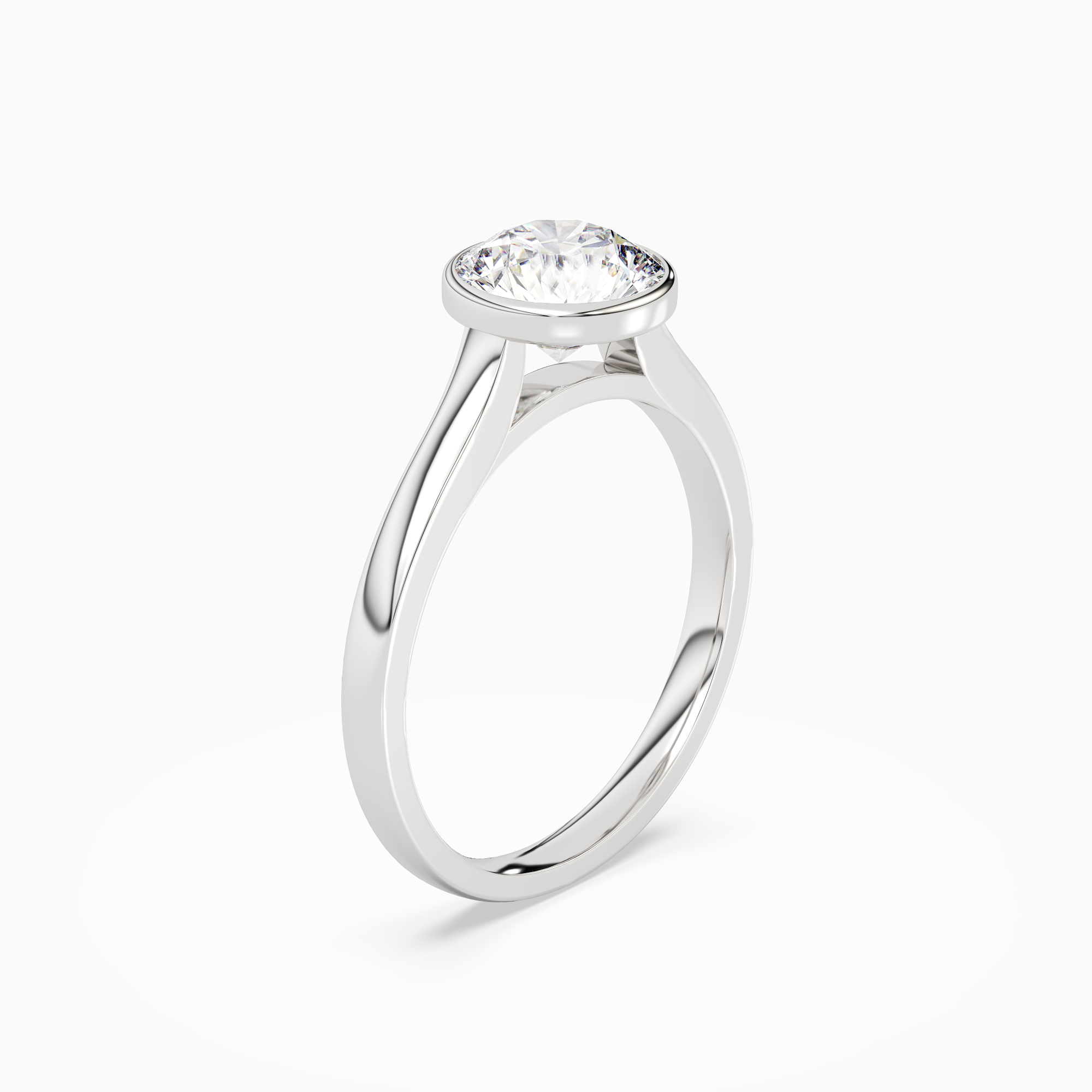 Round Medium Tapered Bezel Solitaire in 18K White Gold angled