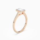 Emerald Slim Tapered Bezel Solitaire in 14K Rose Gold angled