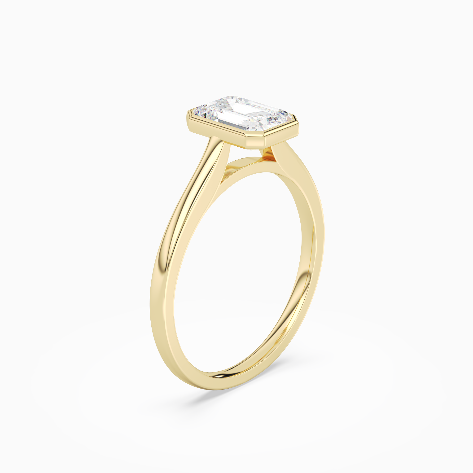 Emerald Slim Tapered Bezel Solitaire in 18K Yellow Gold angled