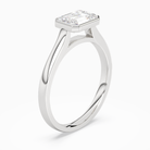 Emerald East-West Bezel Solitaire in 14K White Gold angled