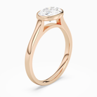 Oval East-West Bezel Solitaire in 14K Rose Gold angled