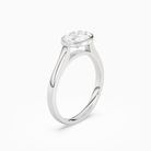 Oval East-West Bezel Solitaire in Platinum angled