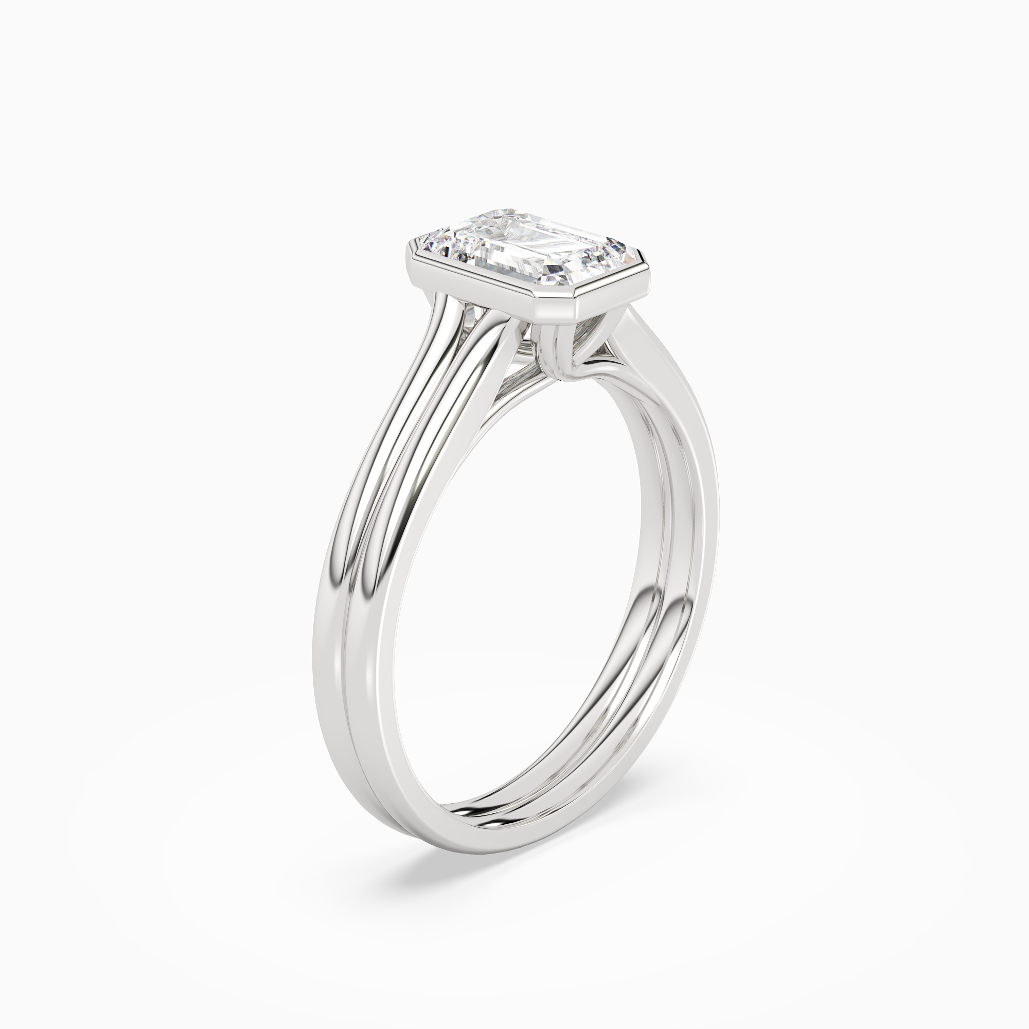 Emerald Stacked Band Bezel Solitaire in 18K White Gold angled