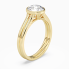 Round Stacked Band Bezel Solitaire in 14K Yellow Gold angled