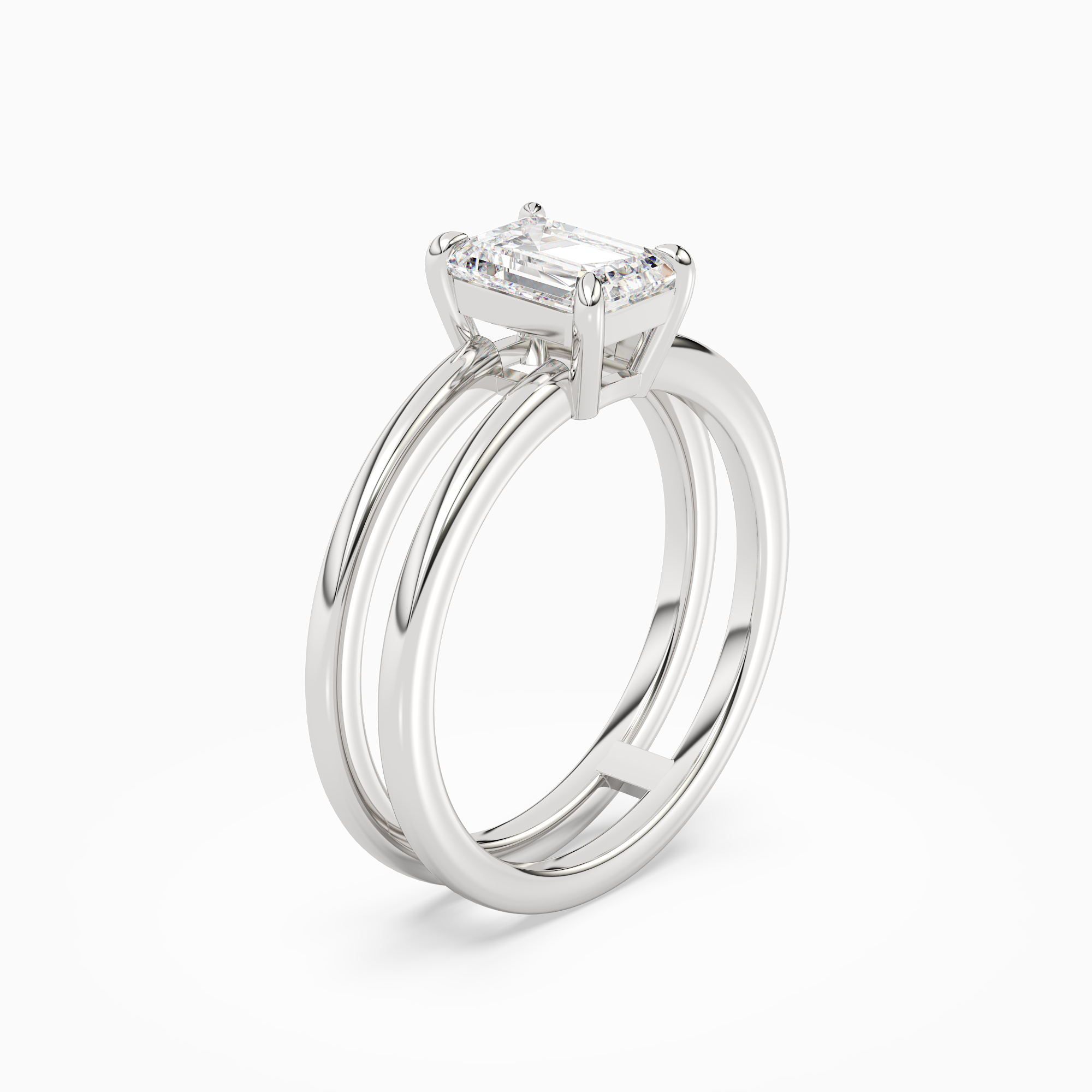 Emerald Open Double Shank Solitaire in Platinum angled