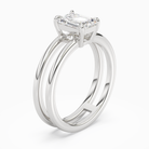 Emerald Open Double Shank Solitaire in Platinum angled