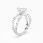 Pear Split Pavé Bypass Solitaire in Platinum angled