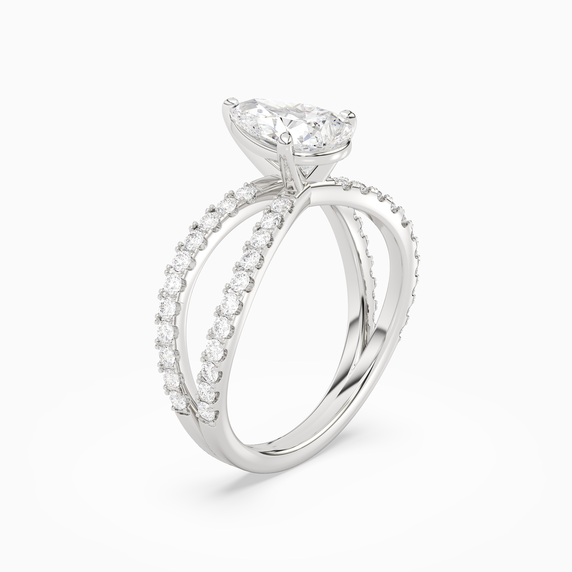 Pear Split Pavé Bypass Solitaire in Platinum angled