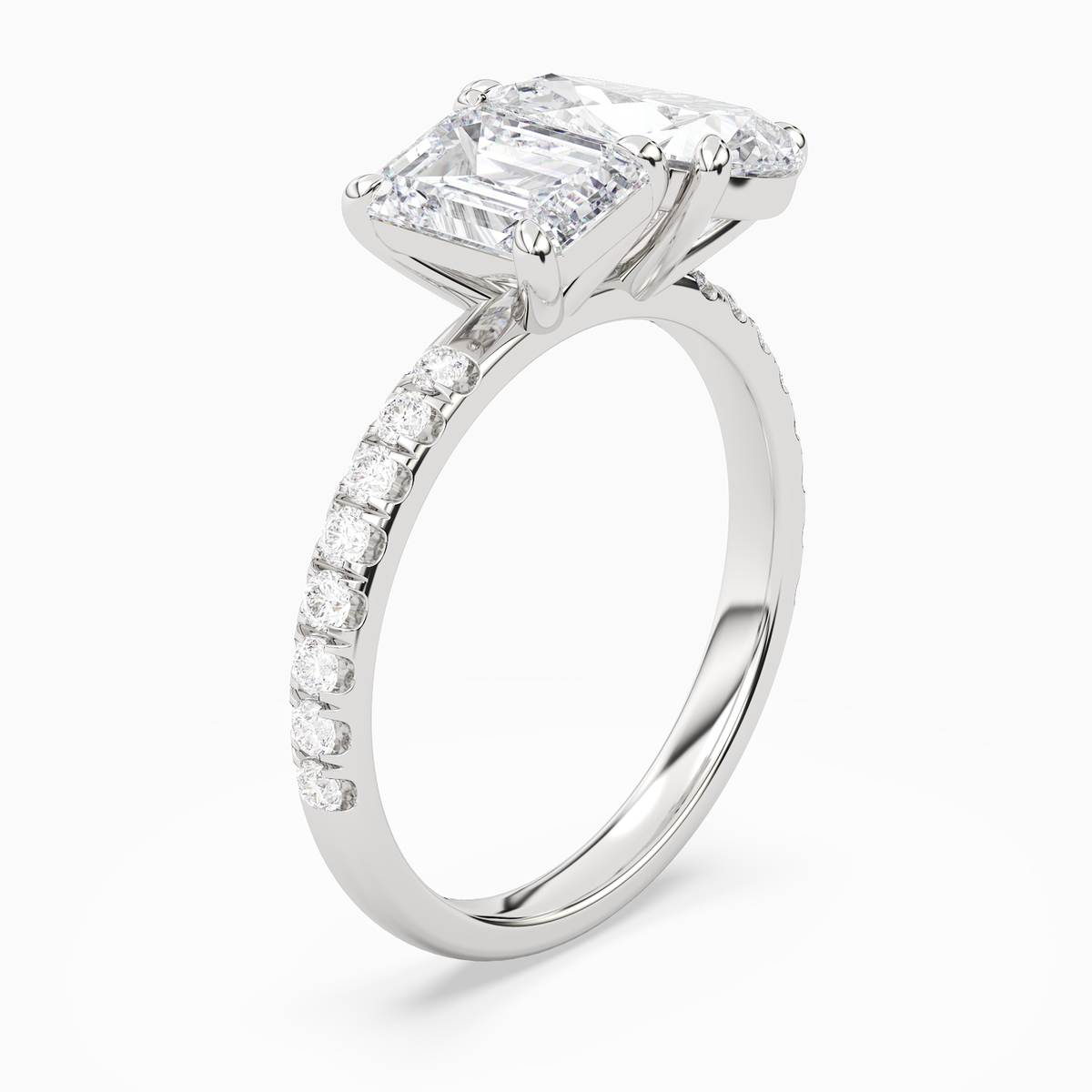 Emerald & Pear Accented Toi Et Moi in Platinum angled