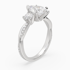 Pear Twisted Vine Three Stone in Platinum angled