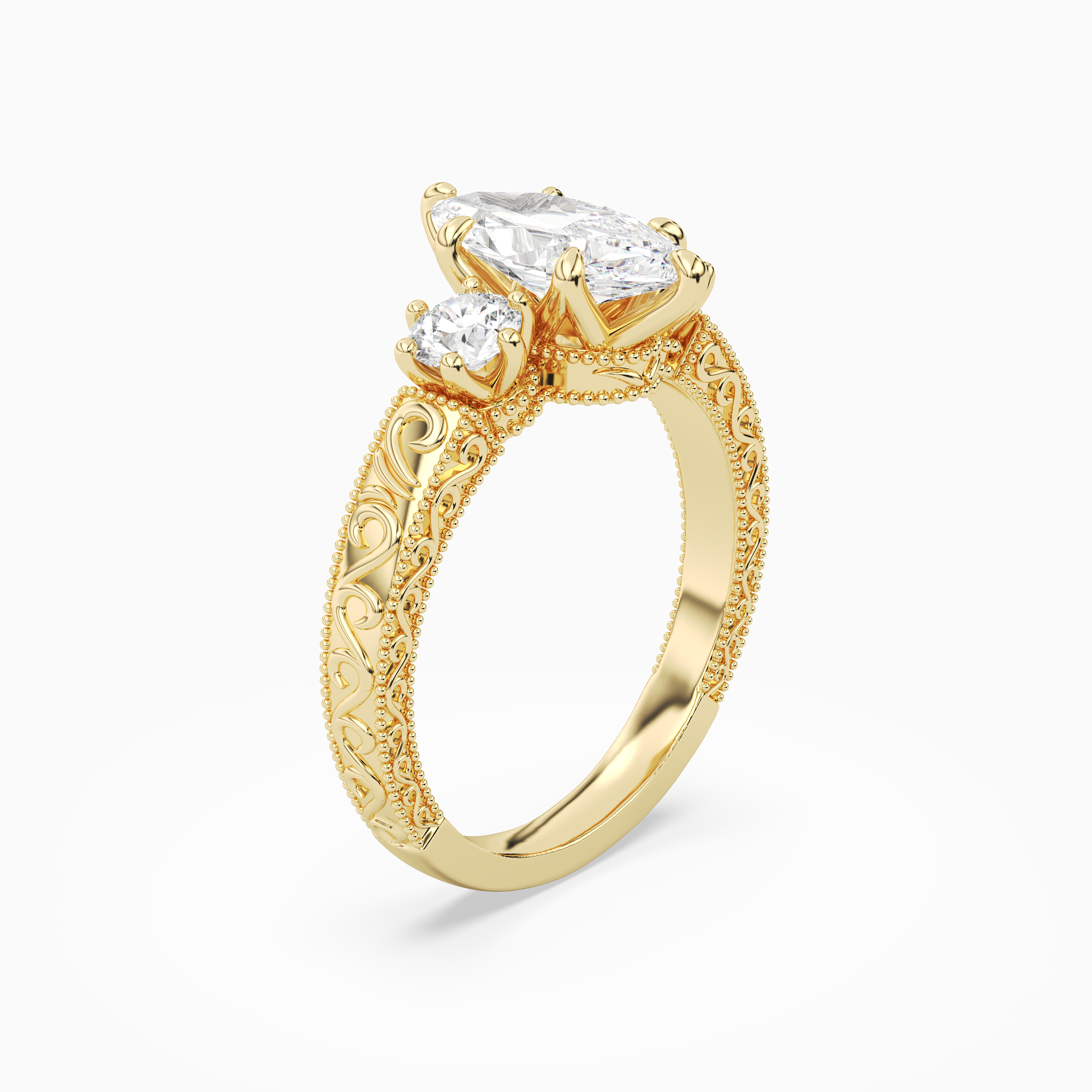 Marquise Engraved Vintage Three Stone in 18K Yellow Gold angled