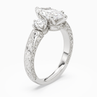 Marquise Engraved Vintage Three Stone in Platinum angled