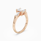 Emerald Baguette Three Stone Large Sides in 14K Rose Gold angled