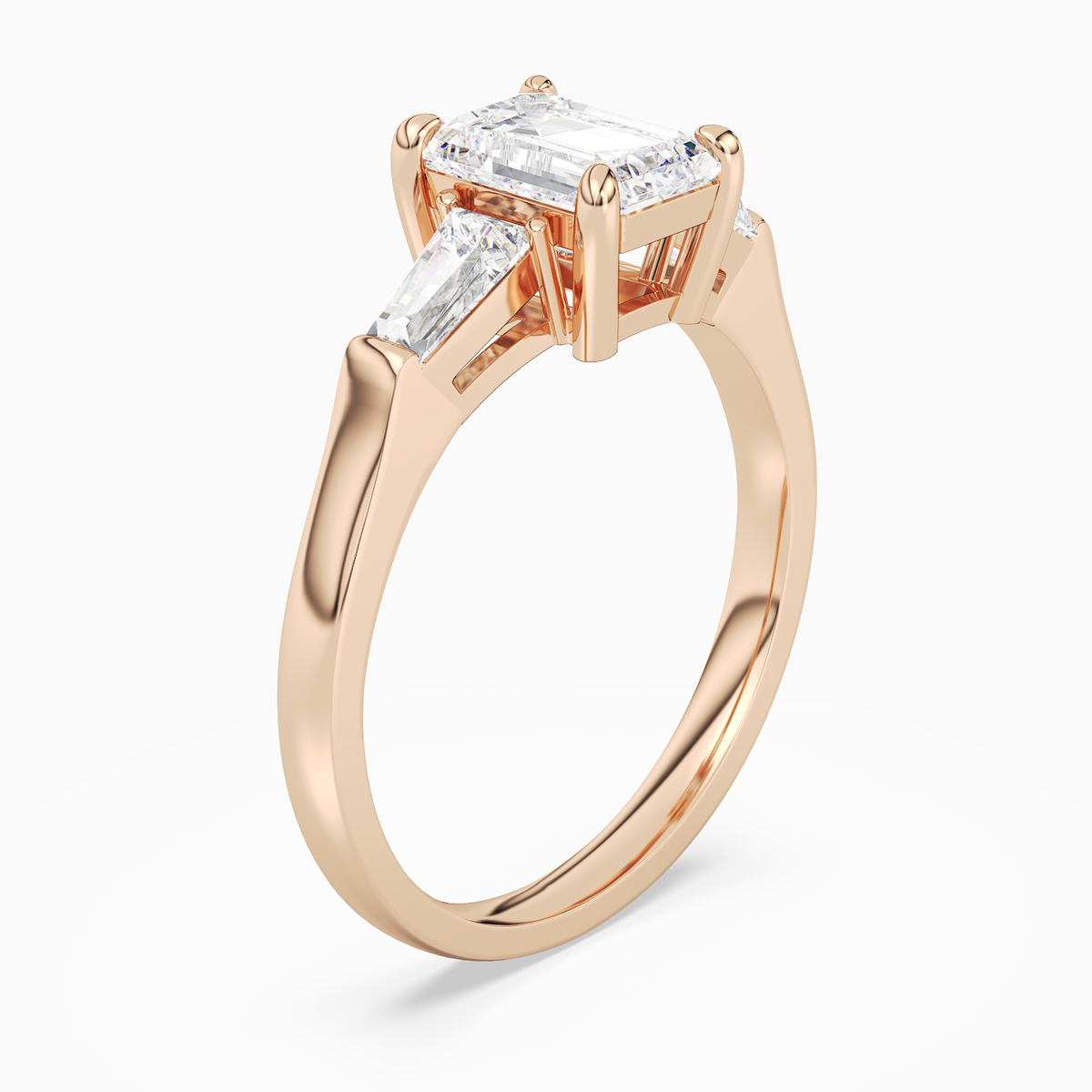 Emerald Baguette Three Stone Large Sides in 14K Rose Gold angled