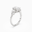 Oval Composite Three Stone Ring in Platinum angled