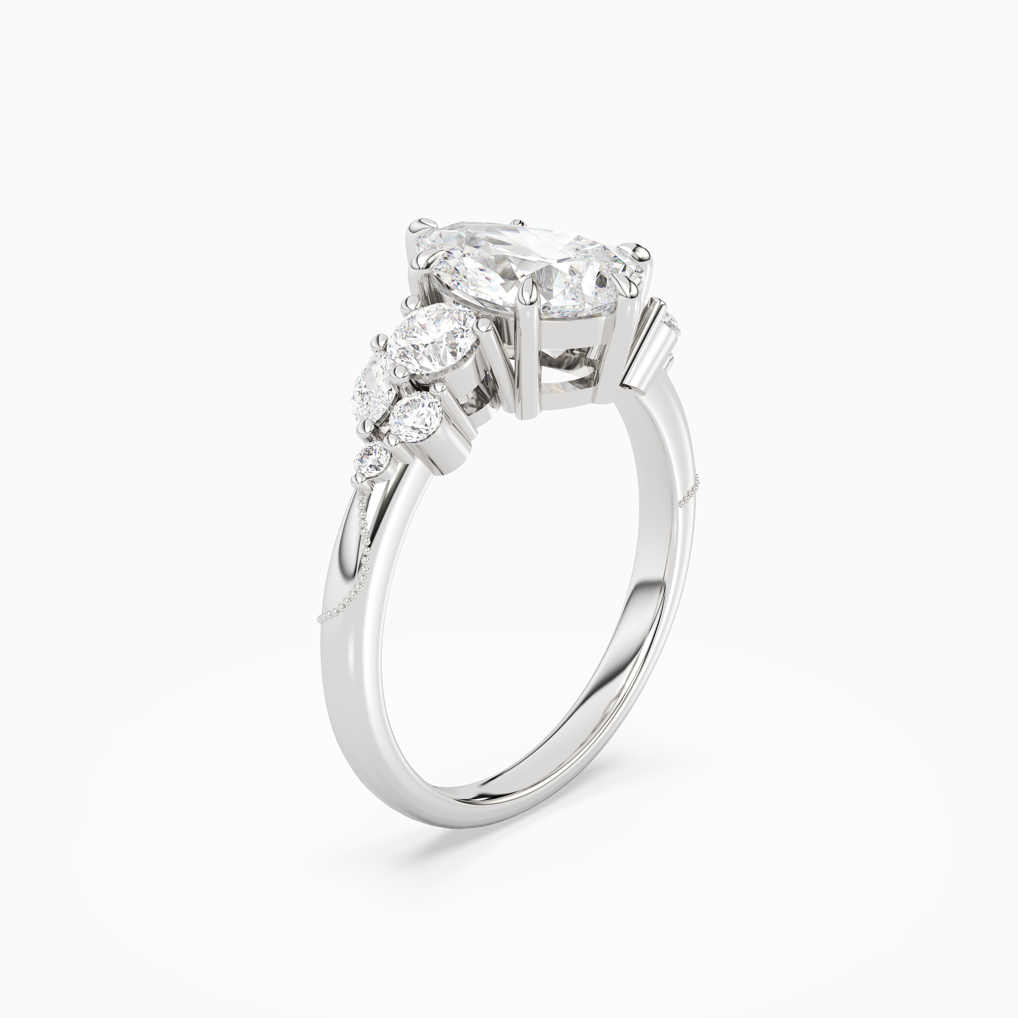 Pear Composite Three Stone Ring in Platinum angled