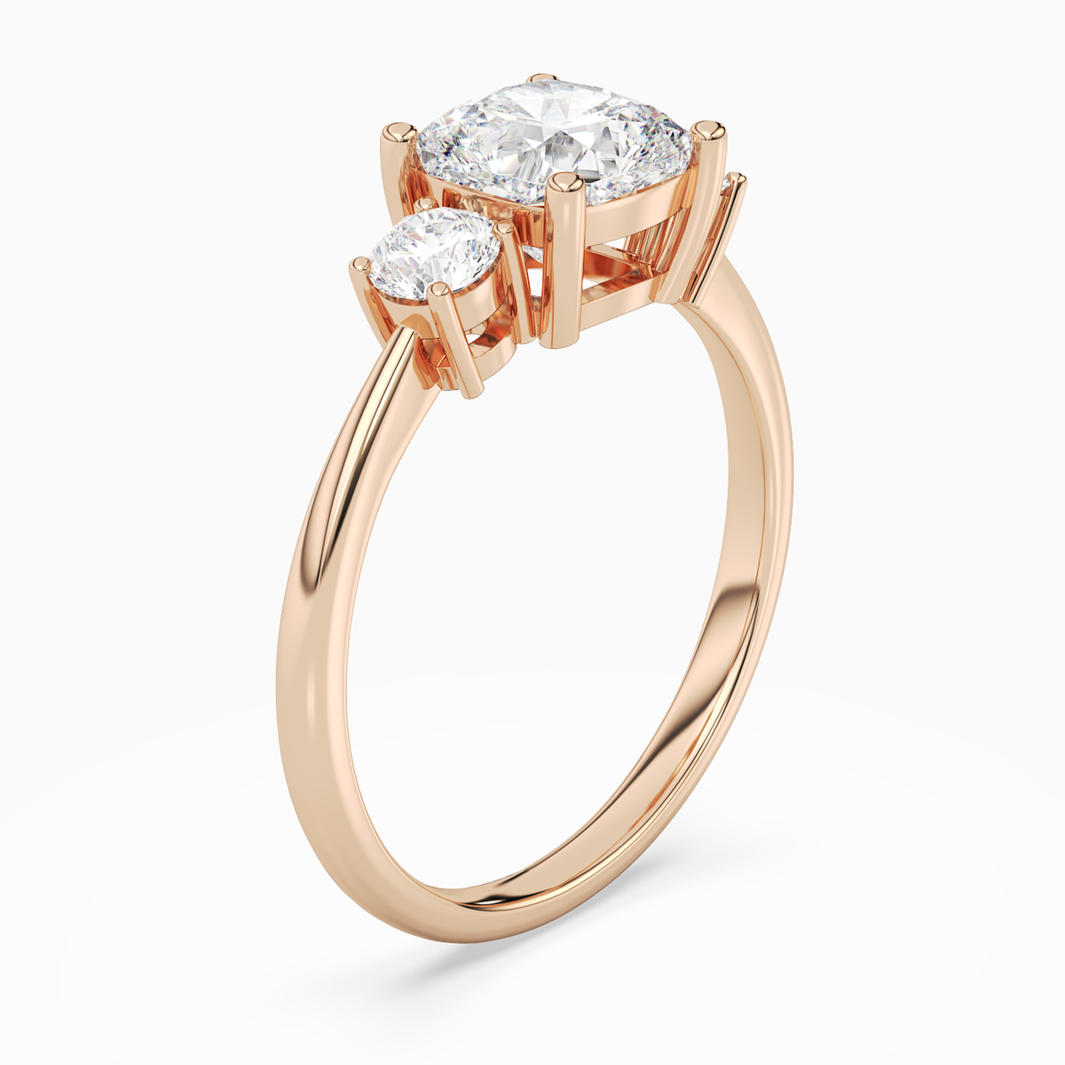 Cushion Classic Round Three Stone Large Sides in 14K Rose Gold angled